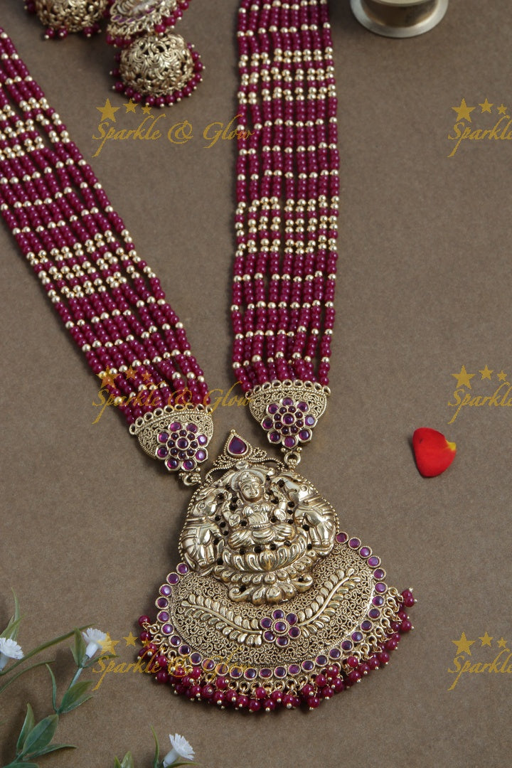 Gold alike lakshmi carved pendent multilayered pink beads necklace
