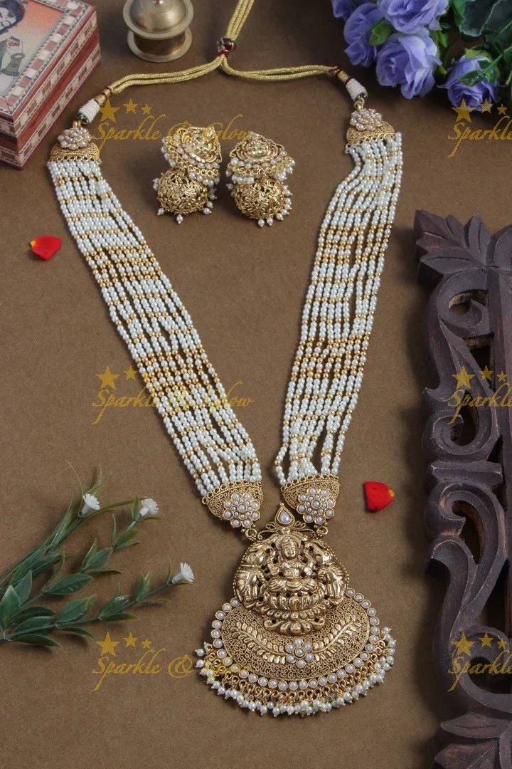 Gold alike lakshmi carved pendent multilayered pink beads necklace - Sparkle and Glow