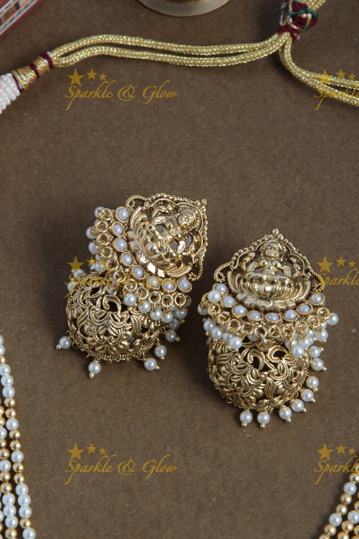 Gold alike lakshmi carved pendent multilayered white beads necklace