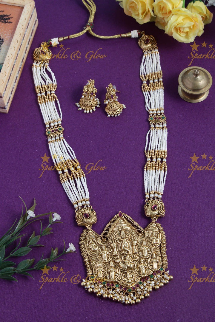 Gold alike lord krishna carved pendent multilayered white beads necklace
