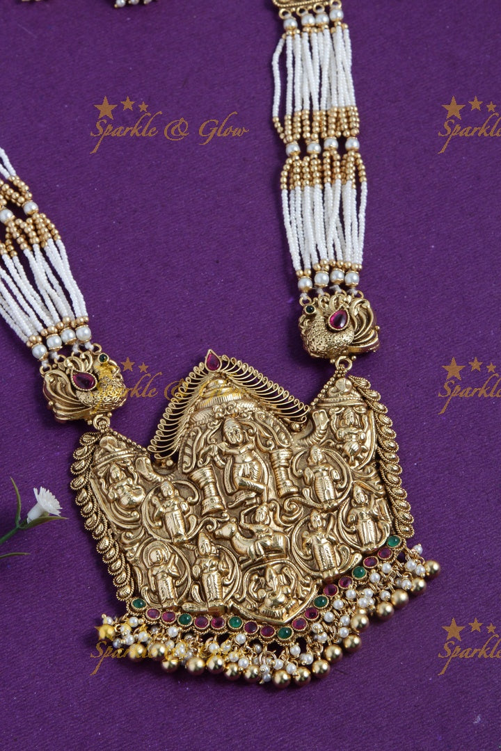 Gold alike lord krishna carved pendent multilayered white beads necklace