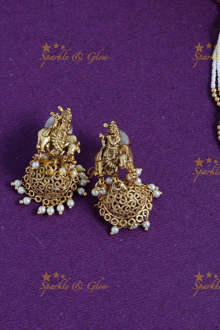 Gold alike lord krishna carved pendent multilayered white beads necklace