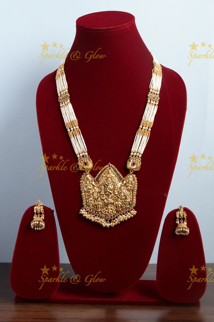 Gold alike lord krishna carved pendent multilayered white beads necklace