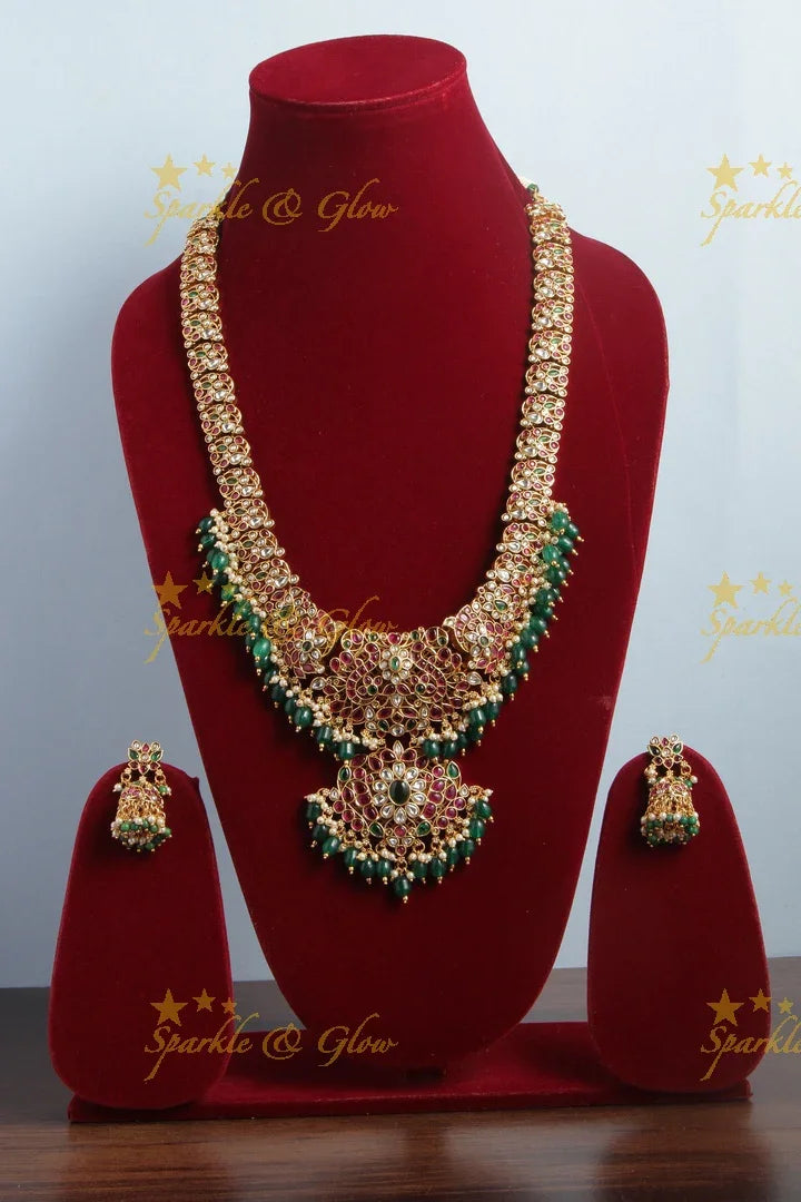Gold alike royal non idol peacock haram with green beads - Sparkle and Glow