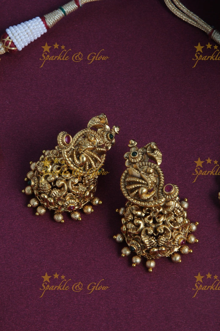 Gold Alike long gold beads and pearl necklace with intricate design side pendent