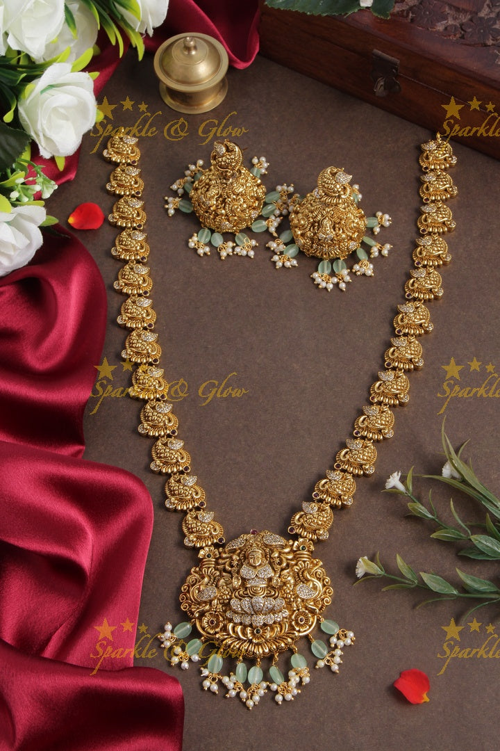 Gold alike peacock lakshmi carved elegant haram with mint green beads