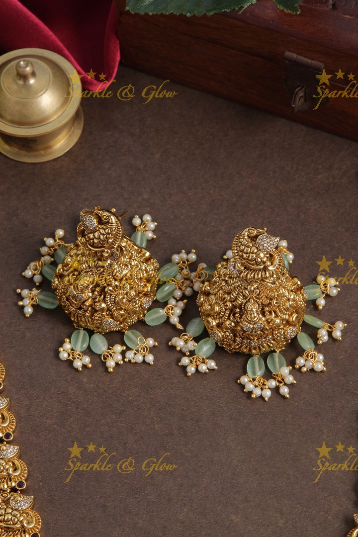Gold alike peacock lakshmi carved elegant haram with mint green beads