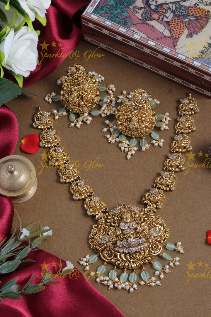 Gold alike elegant Lakshmi necklace with mint green beads