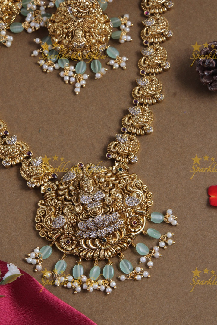 Gold alike elegant Lakshmi necklace with mint green beads