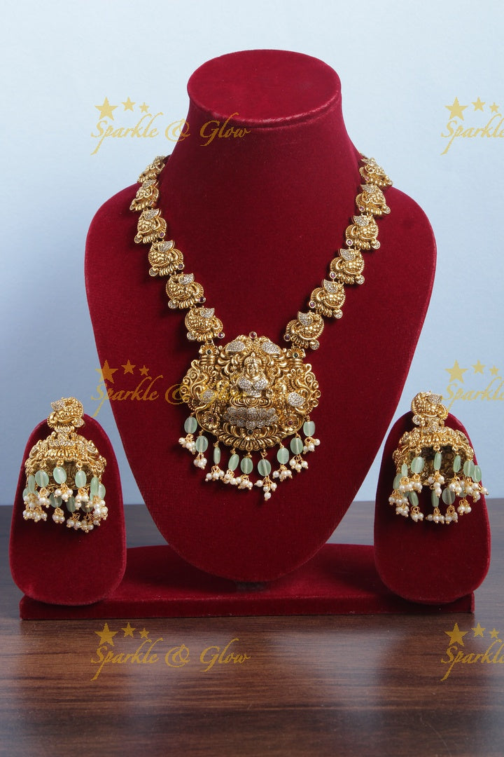 Gold alike elegant Lakshmi necklace with mint green beads