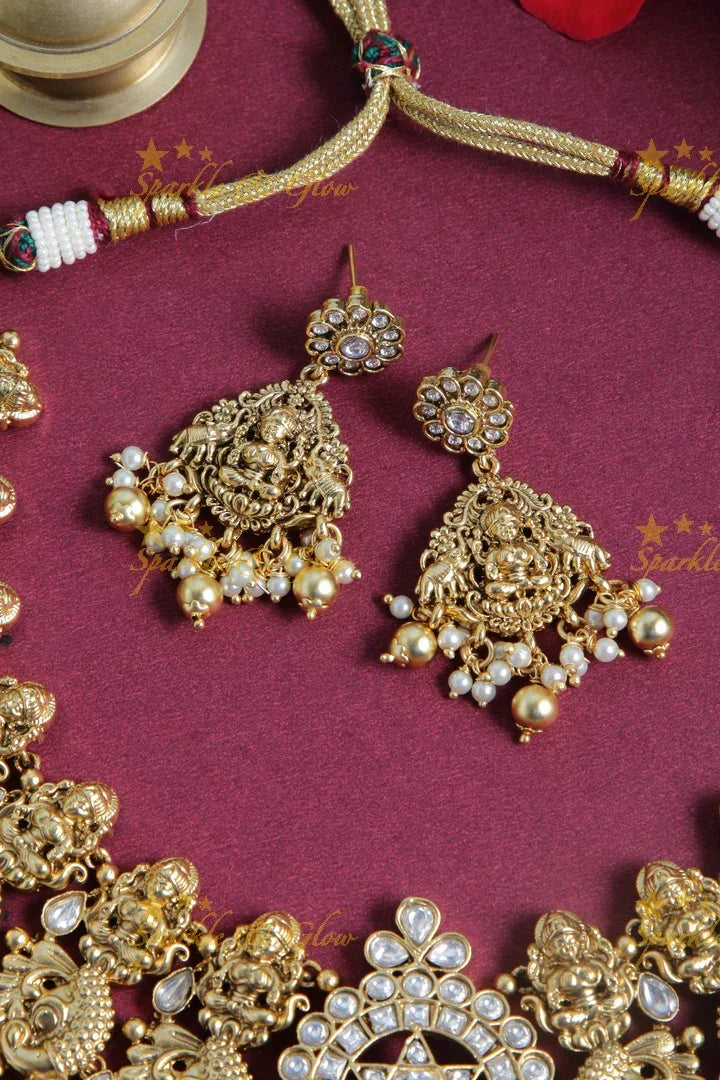 Gold alike dancing peacock and Lakshmi carved necklace - White - Gold beads - Sparkle and Glow