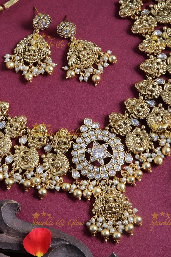 Gold alike dancing peacock and Lakshmi carved necklace - White - Gold beads - Sparkle and Glow