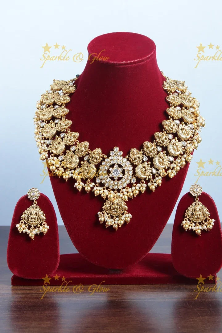 Gold alike dancing peacock and Lakshmi carved necklace - White - Gold beads - Sparkle and Glow