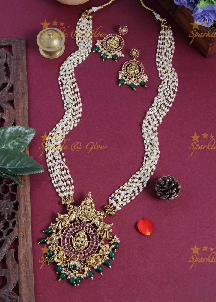 Gold alike blue bead long necklace with intricately carved lakhsmi pendent with gold beads