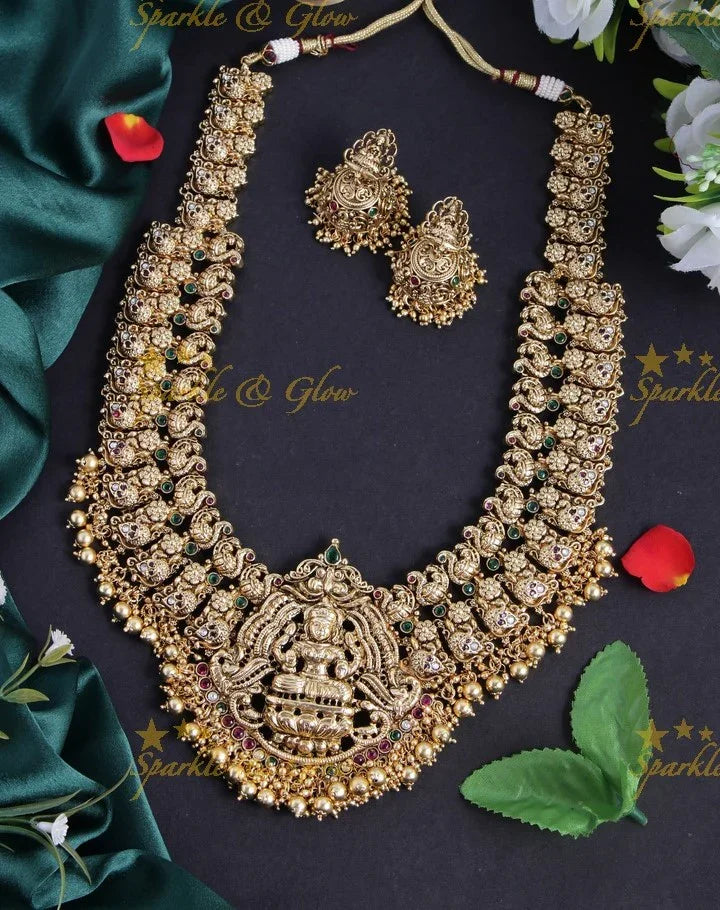 Gold alike exquisite Peacock Lakshmi carved haram with gold beads - Sparkle and Glow