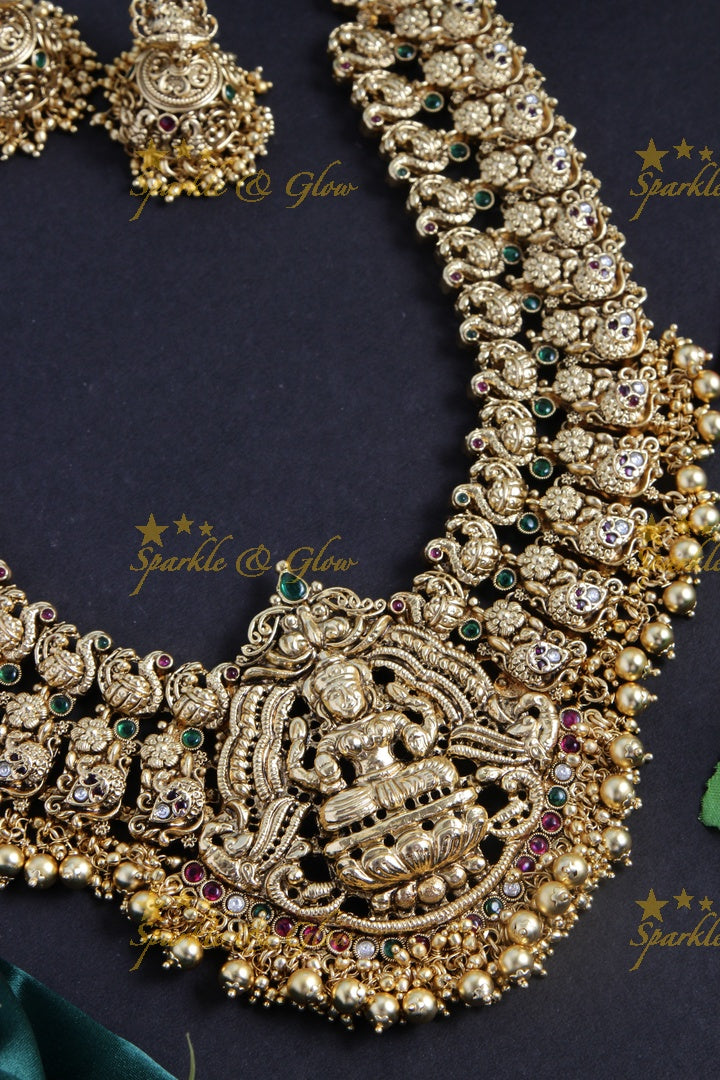 Gold alike exquisite Peacock Lakshmi carved haram with gold beads