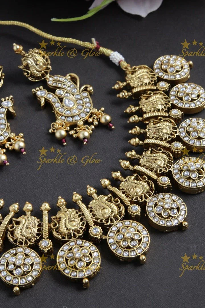 Gold alike kundan stones floral bottu peacock necklace - Sparkle and Glow