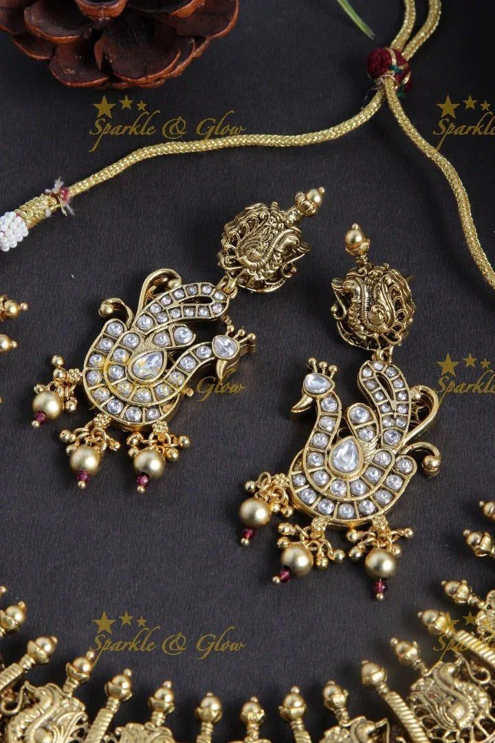 Gold alike kundan stones floral bottu peacock necklace - Sparkle and Glow