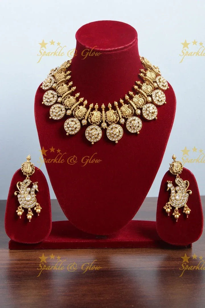 Gold alike kundan stones floral bottu peacock necklace - Sparkle and Glow