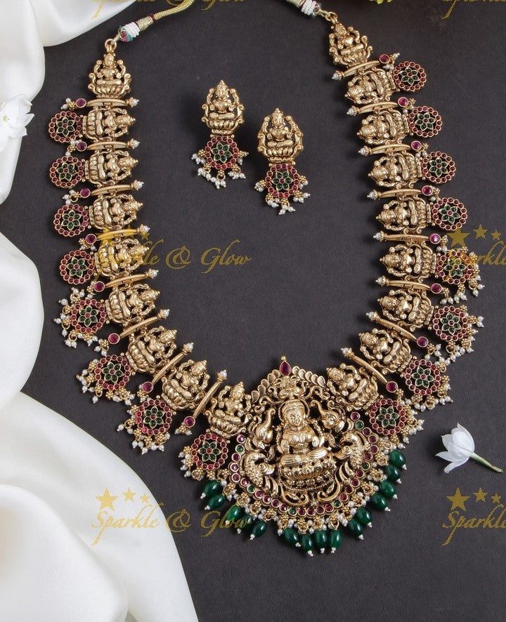 Grand intricate Lakshmi bottu long necklace with ruby emerald and gold beads