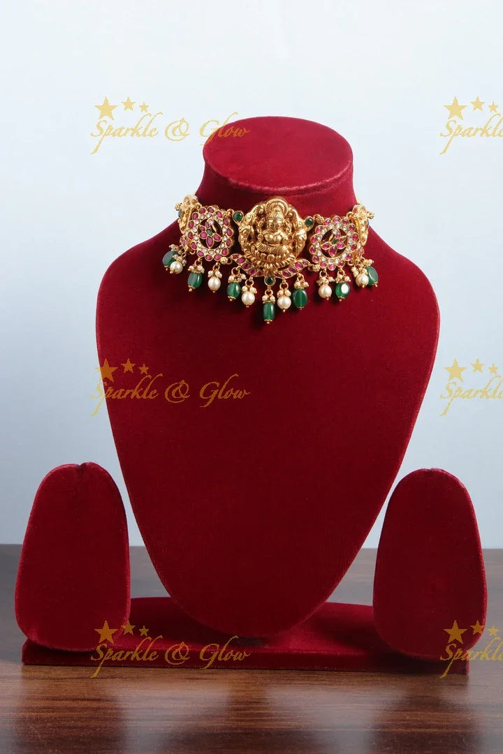 Jadau elegant Lakshmi peacock floral design choker with green pearl drops - Sparkle and Glow