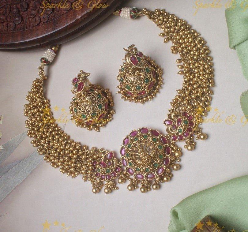 Elegant gold alike gold cluster peacock necklace - White - Sparkle and Glow