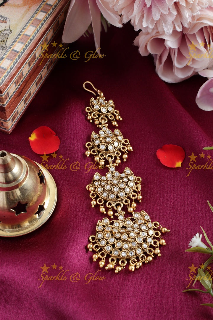 Gold alike half moon design tikka with gold beads