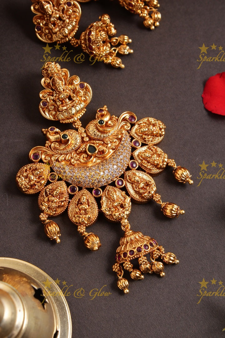 Beautiful gold alike lakshmi peacock carved gold pumpkin beads pendent set