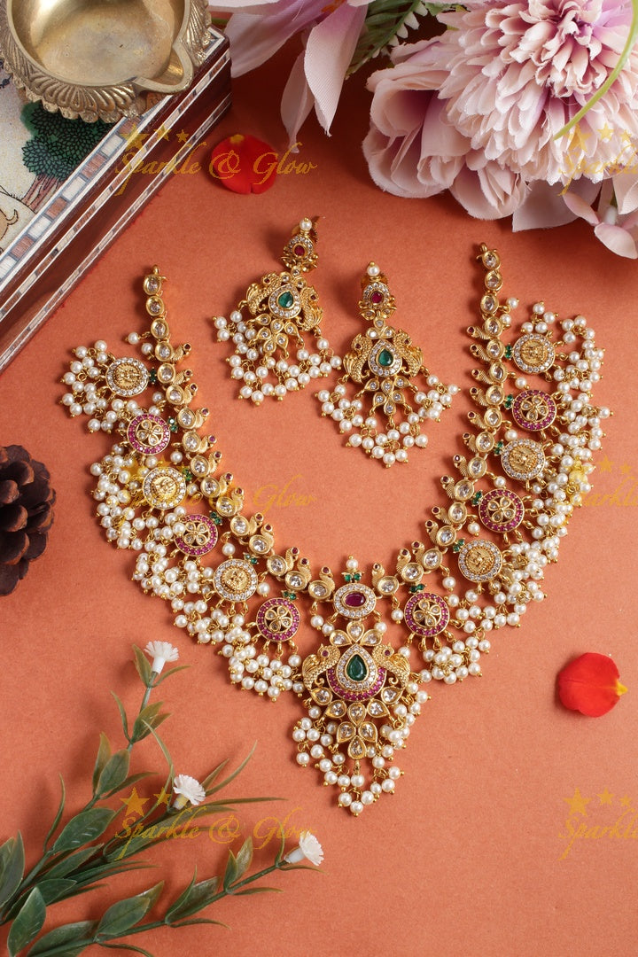 Stunning floral lakshmi and peacock coin guttapusalu necklace