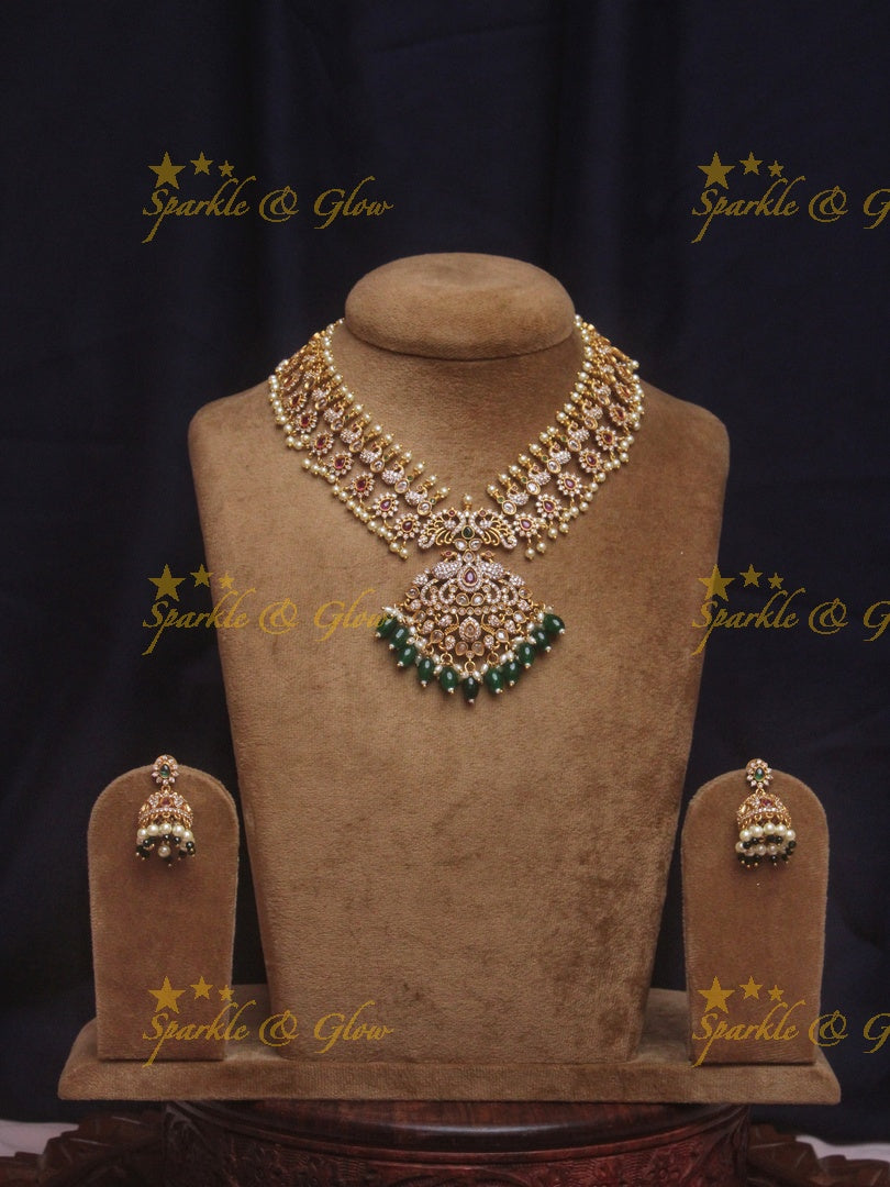 Beautiful floral peacock ad necklace with green beads