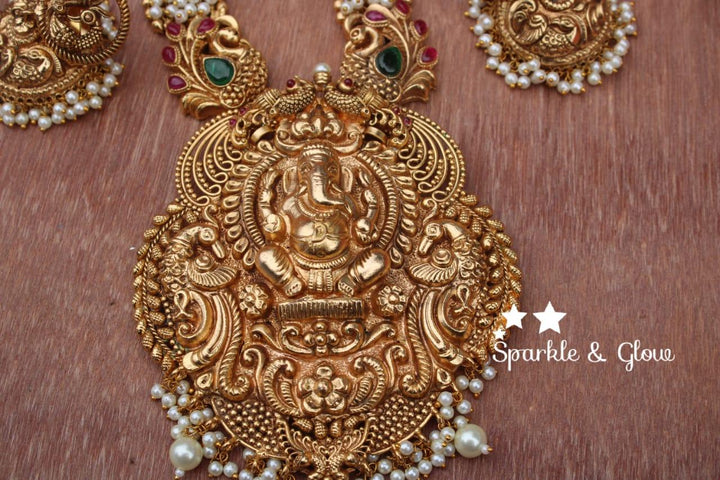Gold alike polished Ganesha carved peacock haram - Pearl - Sparkle and Glow