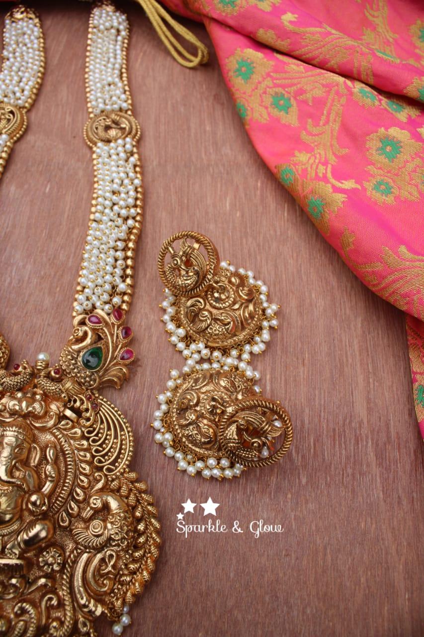 Gold alike polished Ganesha carved peacock haram - Pearl - Sparkle and Glow