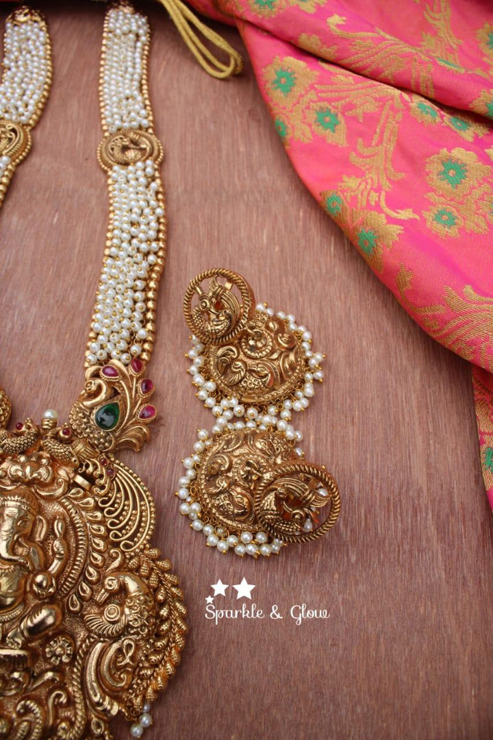Gold alike polished Ganesha carved peacock haram - Pearl - Sparkle and Glow