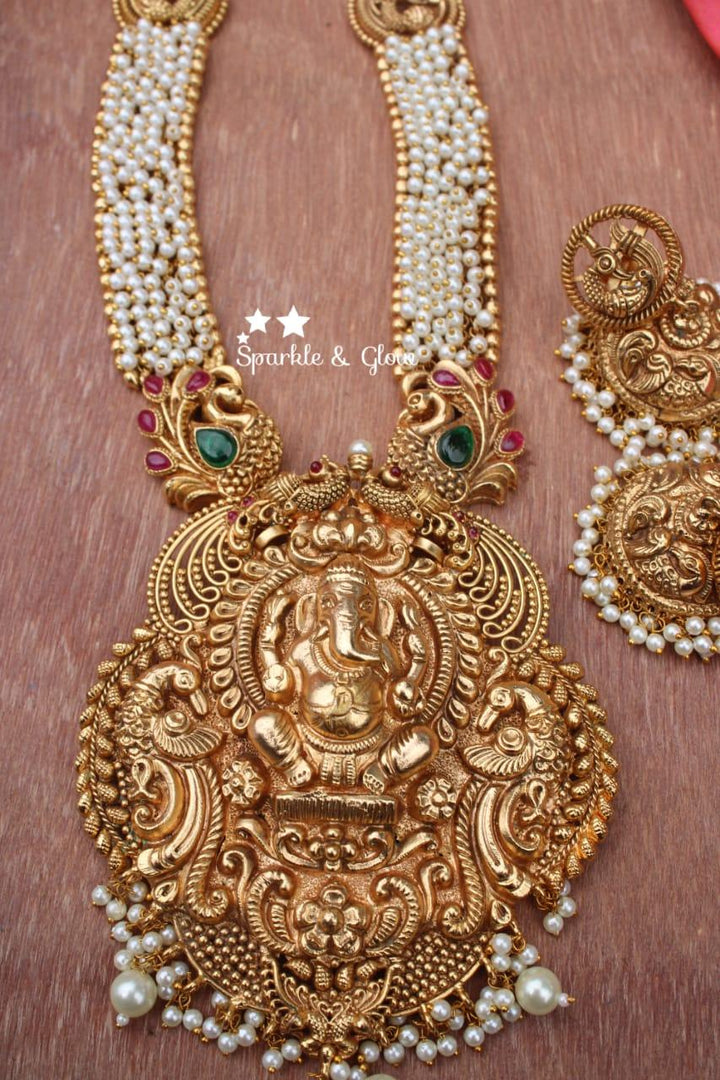 Gold alike polished Ganesha carved peacock haram - Pearl - Sparkle and Glow