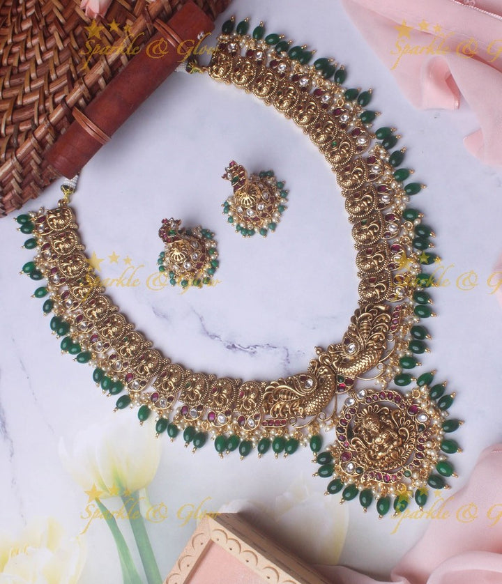 Gold alike Lakshmi peacock haram with green beads