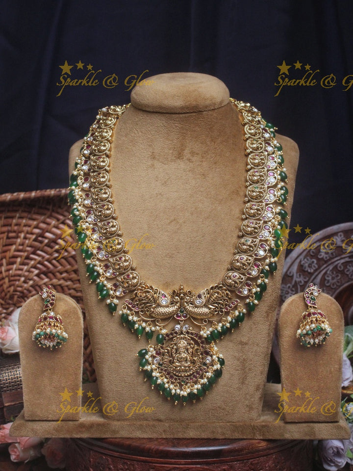 Gold alike Lakshmi peacock haram with green beads
