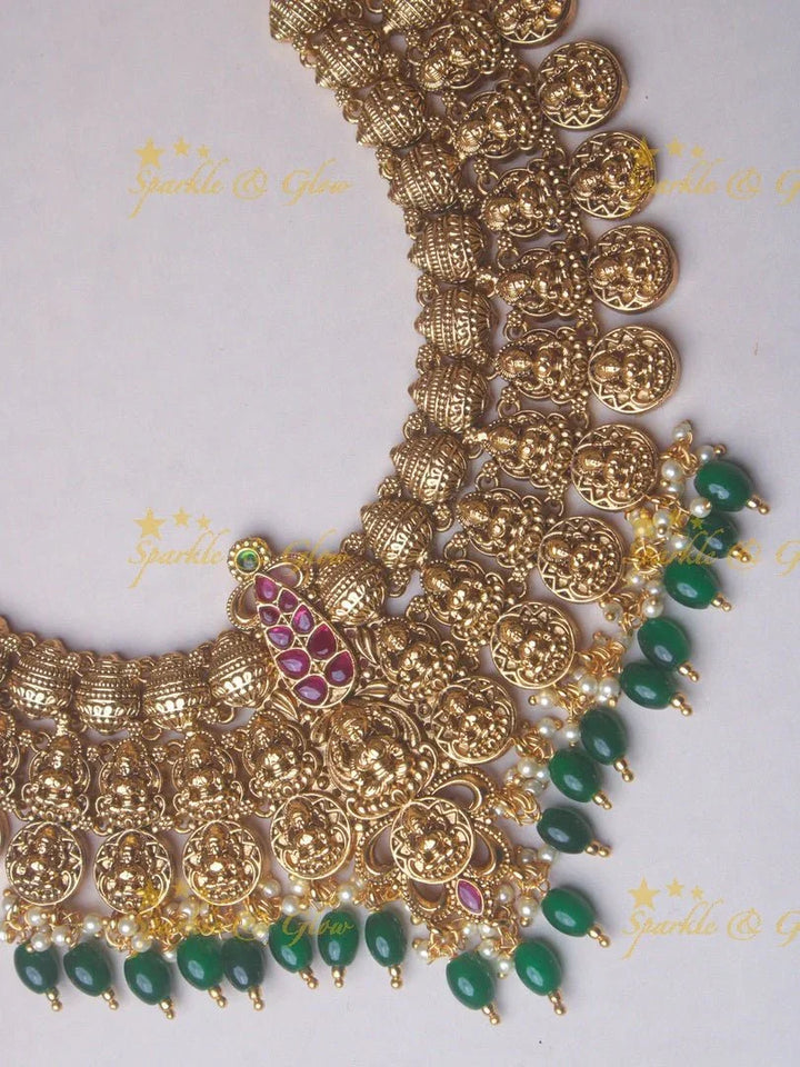 Grand Bridal Gold alike Lakshmi coin haram with green beads - Sparkle and Glow