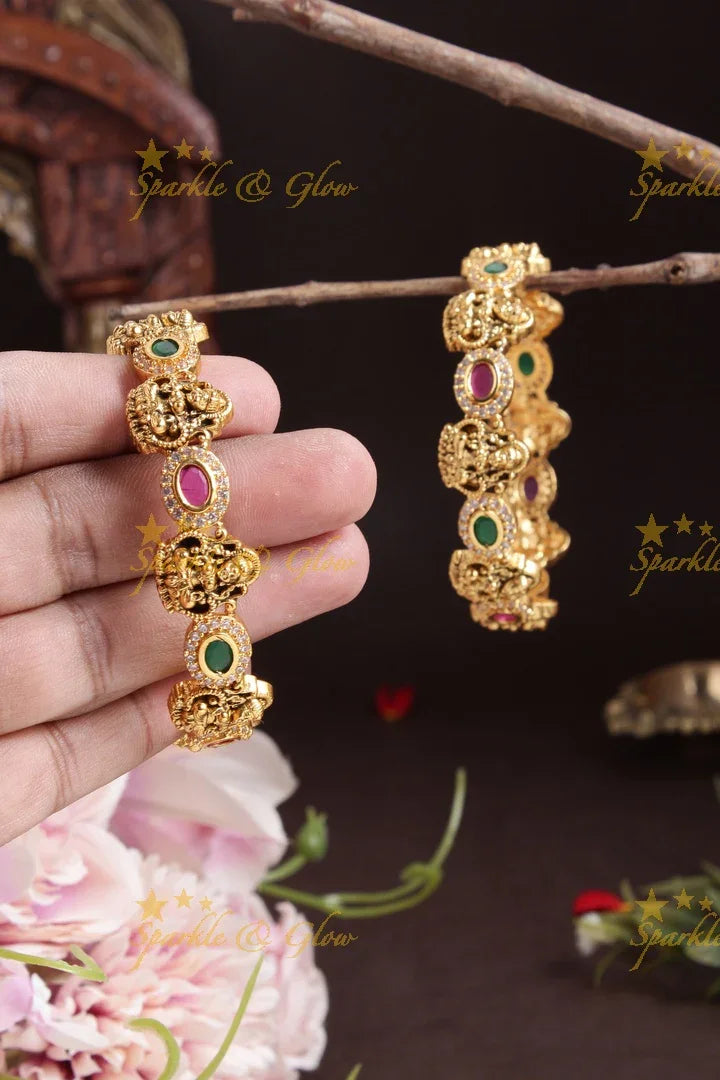 Gold alike lakshmi carved oval stone bangles - Sparkle and Glow