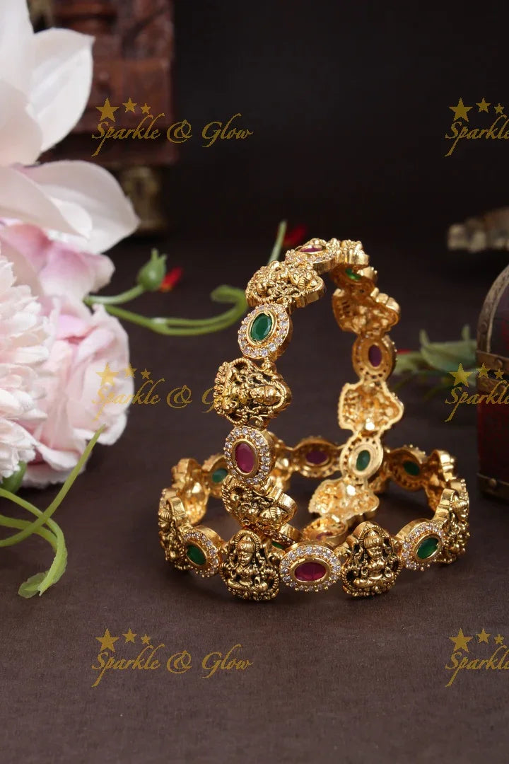 Gold alike lakshmi carved oval stone bangles - Sparkle and Glow