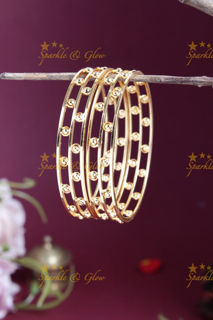 Gold alike intricate deisgn bangles