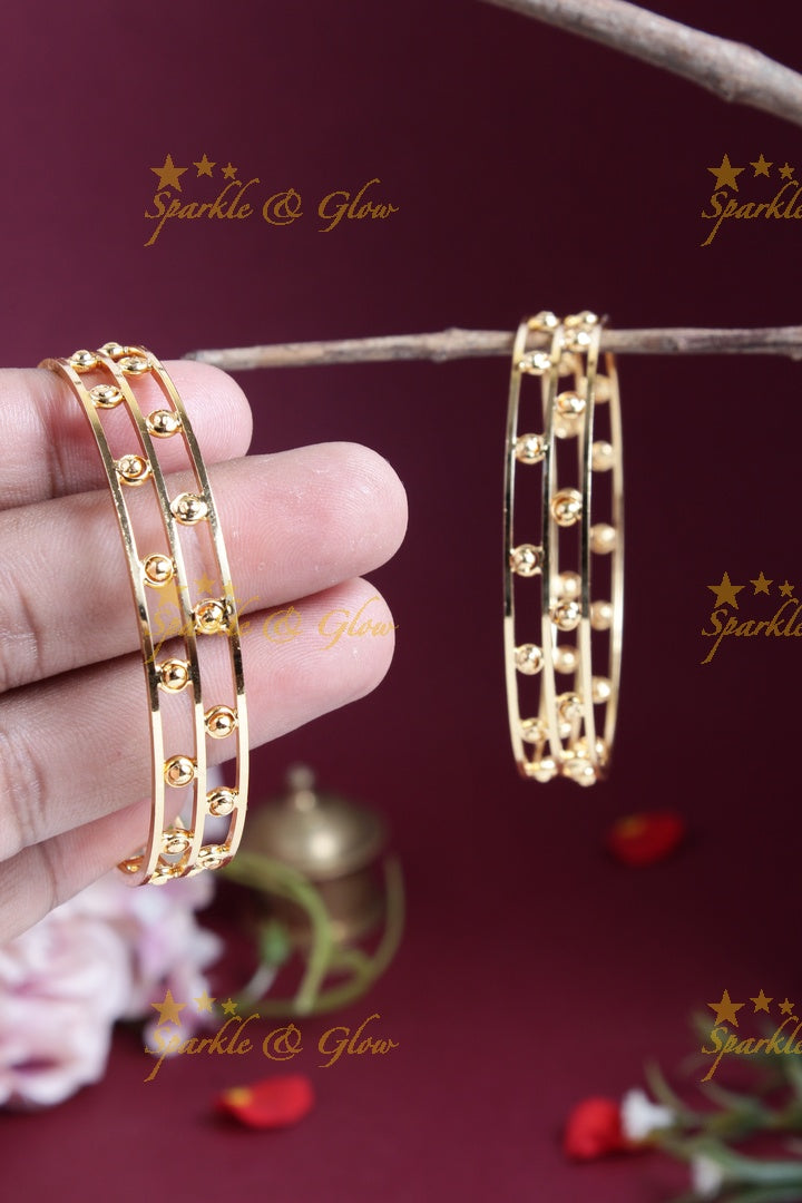 Gold alike intricate deisgn bangles