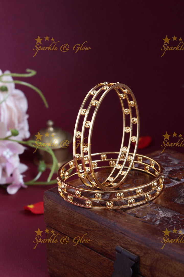 Gold alike intricate deisgn bangles