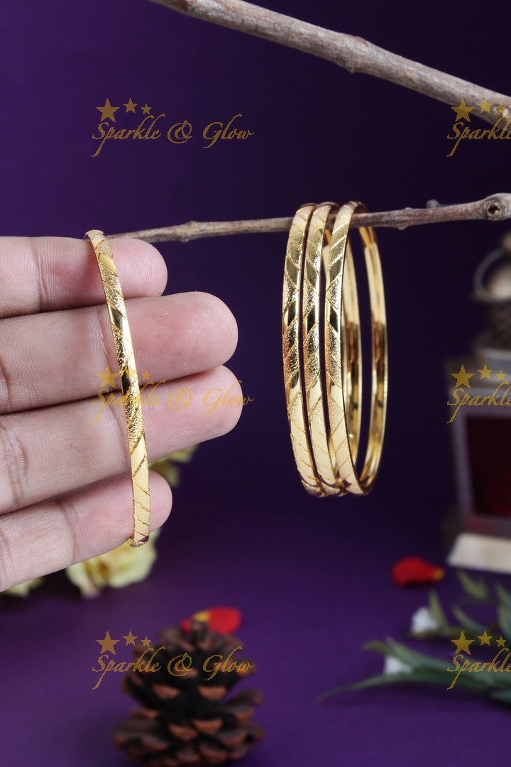 Gold alike simple intricate deisgn bangles