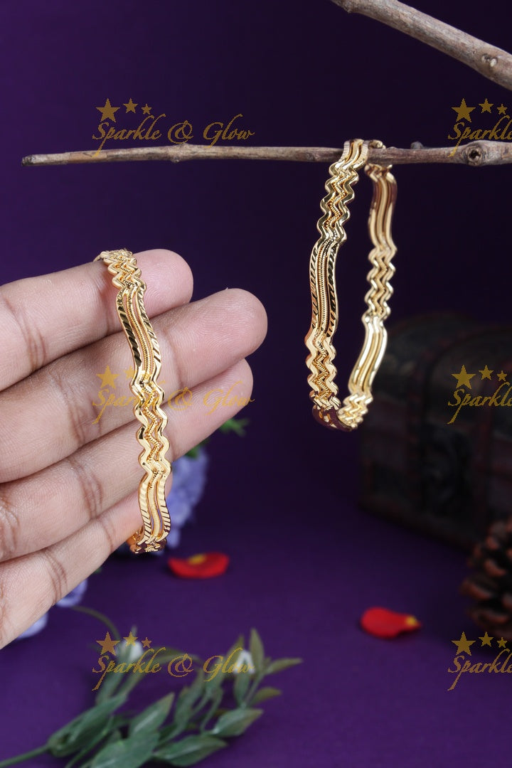 Gold alike beautiful cross design bangles