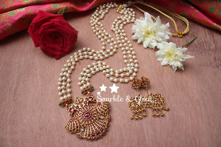 Three layer pearl haram with kemp stones pendent