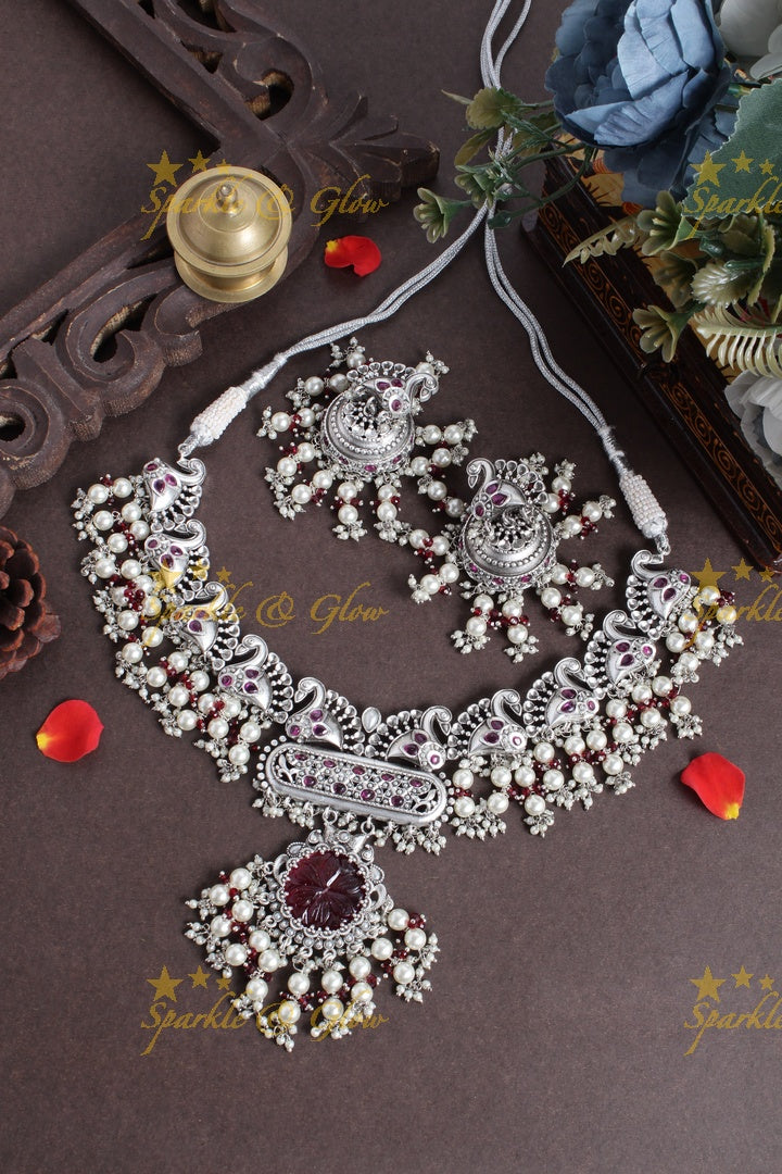 Silver finish peacock design pearl necklace