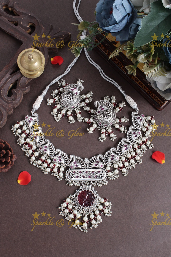 Silver finish peacock design pearl necklace