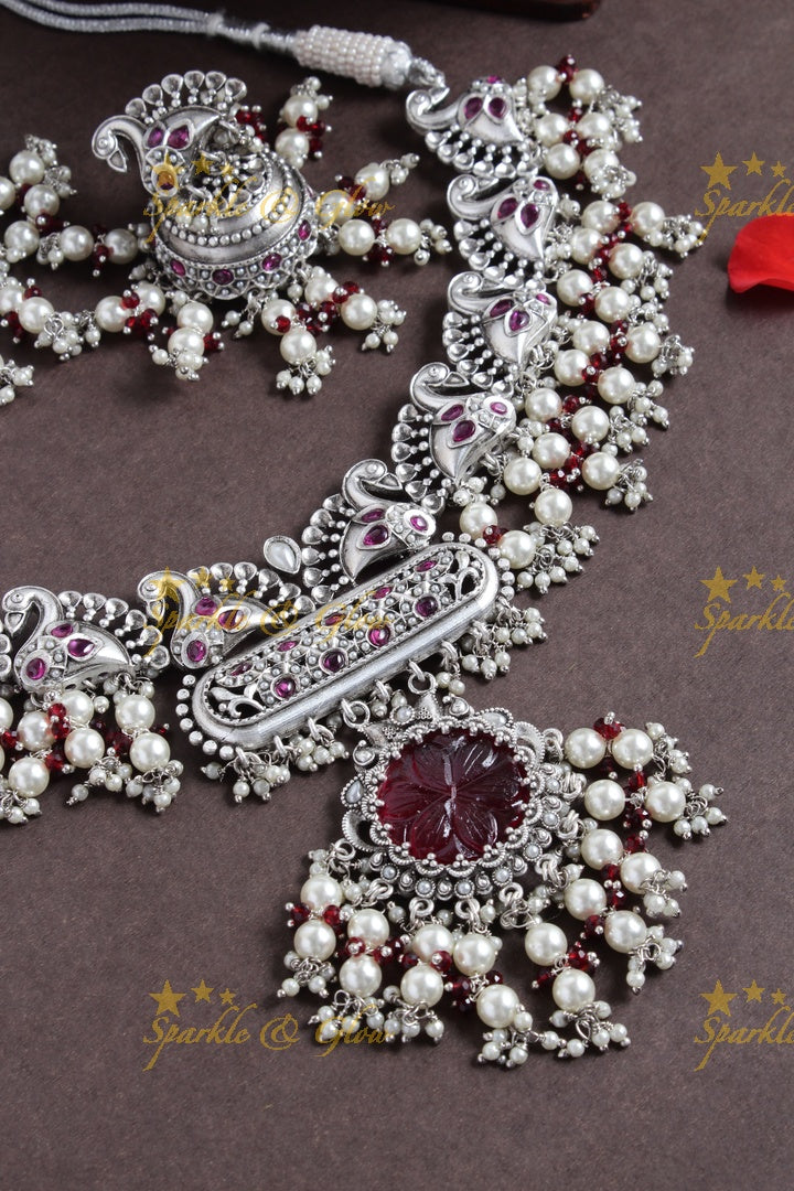 Silver finish peacock design pearl necklace