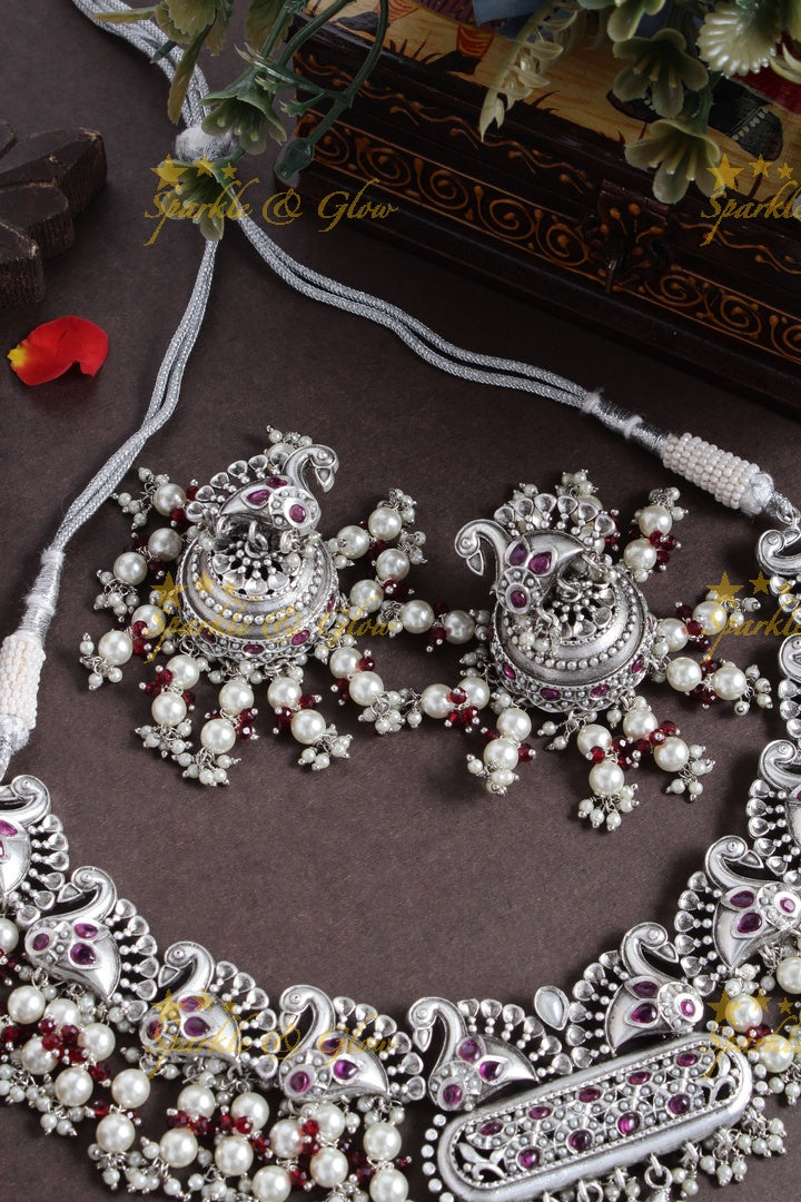 Silver finish peacock design pearl necklace