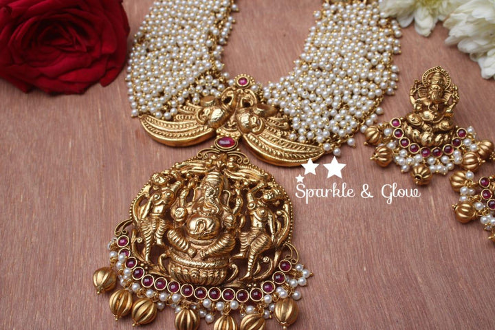 Gold alike polished Ganesha carved pearl cluster statement haram - Sparkle and Glow